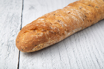 Baguette of grain bread.Grain bread.Healthy breakfast.