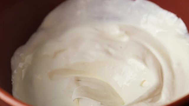 delicious pancake dipped in sour cream