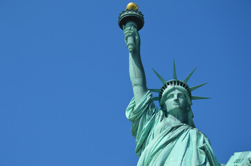 Obraz na płótnie Canvas Lady Liberty with blue sky