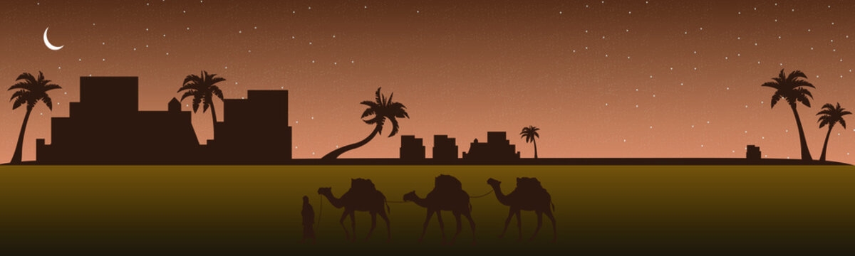 Caravan passes by a city in the desert. Panorama