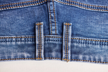 The shape, layout and seams of blue jeans. Fashion and style.
