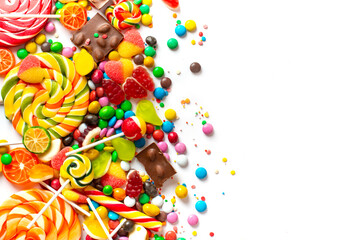 An assortment of colourful, festive sweets, ice-cream and candy in a panoramic orientation.