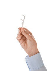 Woman with floss toothpick on white background