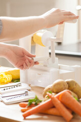 Food processor food spiralizer in kitchen with spiral cut foods