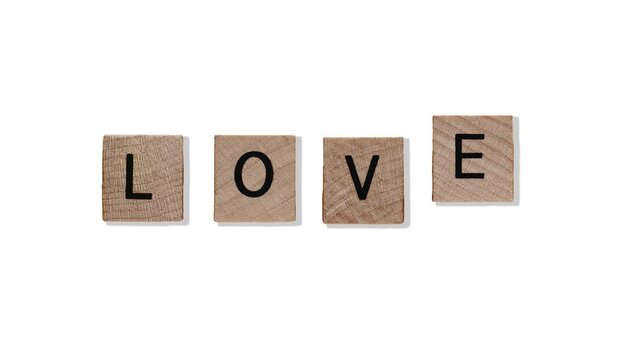 4 in 1 footage templates. animated words - Love text on wooden blocks flying and wigglein in the air on a white color background. Valentine's Day. Postcard, greeting card design. Love, celebration 