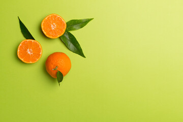 Flat lay with fresh mandarines on color background