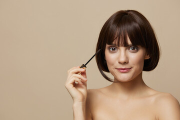 Fototapeta premium beautiful woman smile mascara charm short haircut isolated background