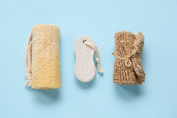 Fototapeta na wymiar Organic bath sponges and pumice on color background