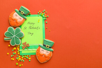 Composition with tasty gingerbread cookies for St. Patrick's Day celebration on color background
