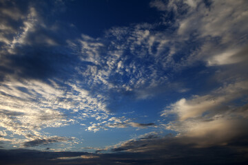 Fototapeta premium Sky with clouds at summer sunset