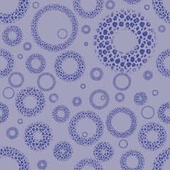 Seamless pattern with circle. Animal print. Seamless pattern with black circles on a purple background. Rings with animal print on a purple background.