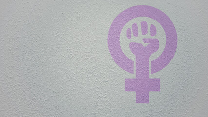 Drawing of strong fist raised up with woman gender with copy space aside on wall