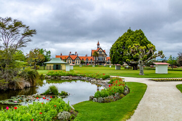 Houses and statues on a tour of the Government Gardens, Rotarua, New Zealand