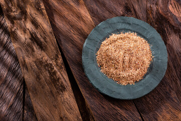 Crushed flax seeds in the bowl - Linum usitatissimum