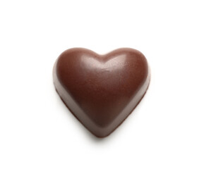 Tasty heart-shaped candy on white background