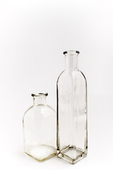 empty, glass vintage bottles on a white background.
