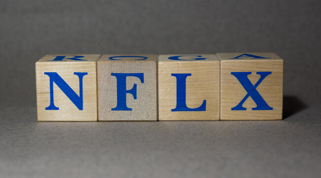 January 19, 2022. New York, USA. The stock ticker symbol of the Netflix NFLX company, made of wooden cubes, on a gray background.