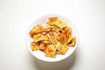 .Pizza cone served with rosemary and coarse salt, seasoned with olive oil