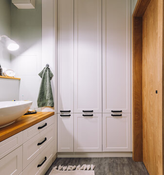 A Vertical Shot Of A Nice Bathroom Interior With Different Appliances