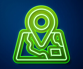 Glowing neon line Folded map with location marker icon isolated on blue background. Vector