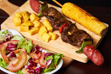 beef and chorizo skewers with roasted corn and grilled corn