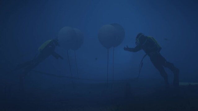 Deep Sea Divers Lowering Nuclear Generator Animation