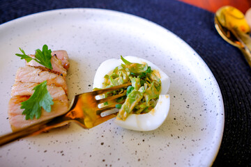Marinated porks with Fish sauce and betel nut mix spicy sauce on the Egg

