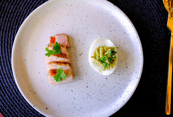 Marinated porks with Fish sauce and betel nut mix spicy sauce on the Egg
