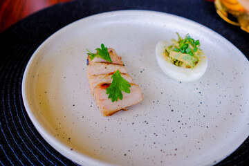 Marinated porks with Fish sauce and betel nut mix spicy sauce on the Egg
