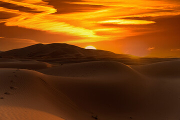 Fototapeta na wymiar The Colors Of The Sky Glow As The Sun Rises On The Sahara Desert In Morocco, Arica