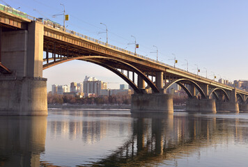 Fototapeta na wymiar Arch bridge over the Ob river in Novosibirsk