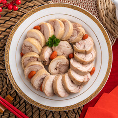 Delicious sliced chicken roll soaked in Chinese wine for lunar new year's dishes.