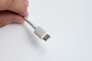 USB cable type C over white isolated background