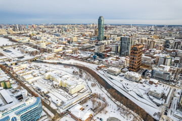 Fototapeta premium Yekaterinburg aerial panoramic view at Winter in cloudy day. Ekaterinburg is the fourth largest city in Russia located in the Eurasian continent on the border of Europe and Asia.