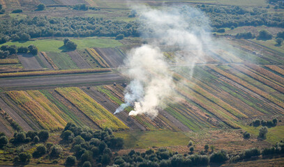 Agriculture fires during spring. Aerial view of some field fires in order to clean the fields for agriculture planting. Farming industry.  Air pollution.