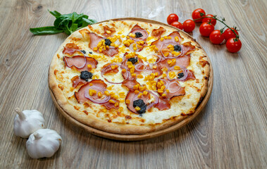 pizza with ham chesse onion corn and truffles