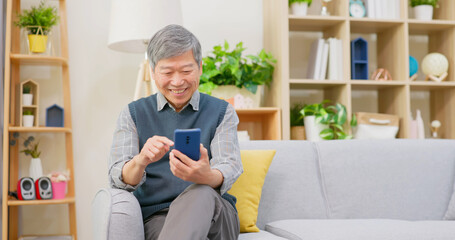 old man use mobile phone