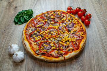 pizza with prosciutto, onion, red pepper, corn, tomato sauce, mushroom and cheese