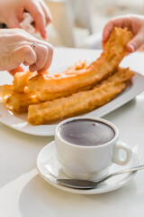 churros con chocolate, a typical Spanish sweet snack