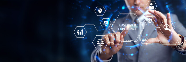 Business, Technology, Internet and network concept. Technology future. Young businessman clicks on the virtual display button: Customer Experience.