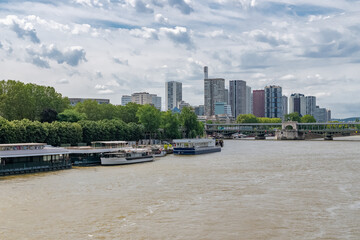 Obraz premium Paris, the Grenelle bridge on the Seine, with the towers of Beaugrenelle 