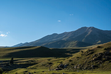 Obraz premium Mountain landscape. Dzungarian Alatau nature. Tourism, travel in Kazakhstan, concept.