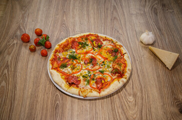 pizza with salami mozzarella red pepper corn dill and tomato sauce