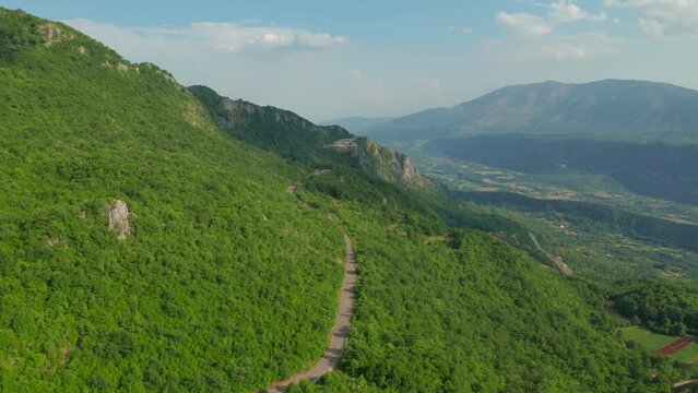 Aerial view on green mountains with road from near ostrog monastery, Montenegro.