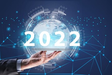 Global network. 2022 New Year concept. Hand and numbers