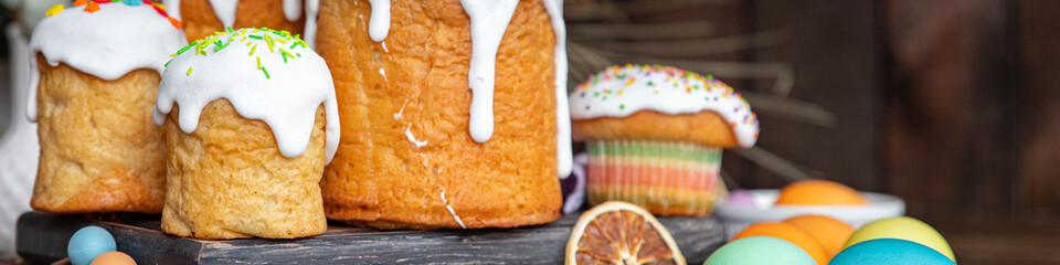 easter cake white icing and colored decorations sweet bread homemade baking dessert celebratory...