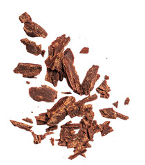 Grated Chocolate pieces isolated on white background. Crushed dark chocolate Top view. Flat lay.