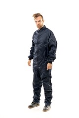 Naklejka premium Middle age white man wearing a black raincoat standing over isolated white background looking happy. Worker concept.