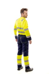 Fototapeta premium A middle-aged white man wearing a green working uniform standing over isolated white background looks happy. Worker and builder concept.