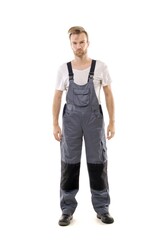 Fototapeta premium A middle-aged white man wearing a gray uniform standing over isolated white background looks happy. Worker and builder concept, mannequin.